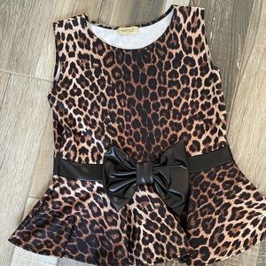 Cute and classy Animal print top from England.